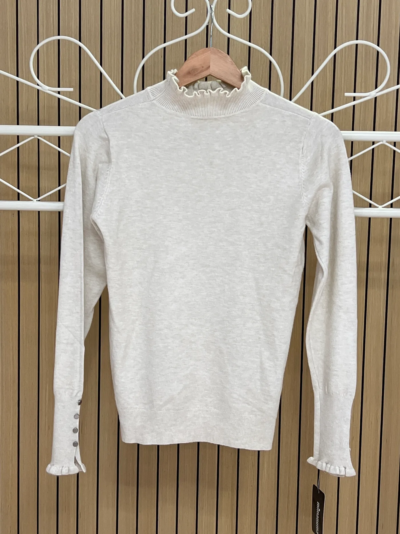 Jersey punto cuello y puños volantes botones beige