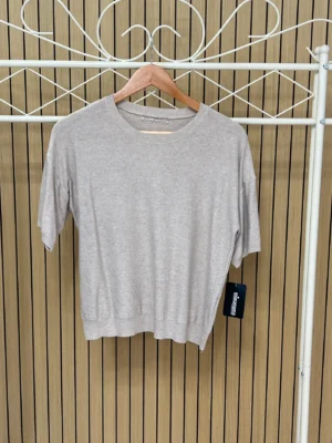Jersey punto fino manga corta brillos taupe